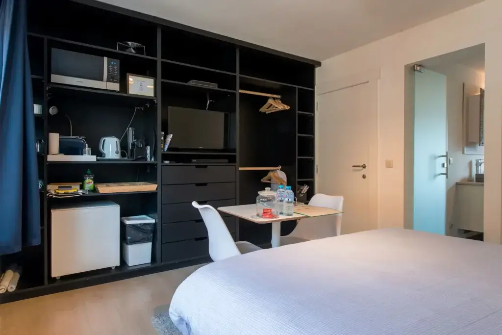 Bedroom with double bed and sitting area